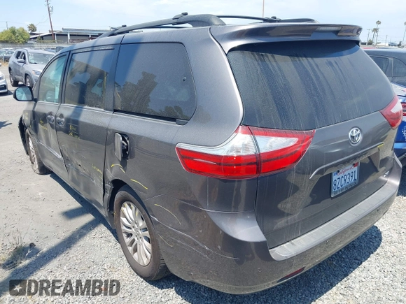 2015 Toyota Sienna XLE with VIN 5TDYK3DC2FS686969, listed as a IAAI auction lot 42559541 with 103,190 mi miles and . Bid and sale history available at DreamBid. Image 3.