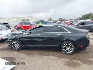 2018 Lincoln MKZ Select z VIN 3LN6L5C93JR620170, wystawiony jako IAAI lot #41488730 z przebiegiem 101 040 mil mil oraz . Historia ofert i sprzedaży dostępna na DreamBid. Obrazek 15.