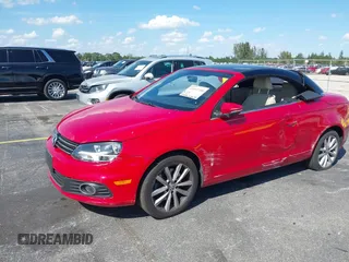 2013 Volkswagen Eos Komfort with VIN WVWBW8AH9DV008763, listed as a IAAI auction lot 41893700 with 53,766 mi miles and . Bid and sale history available at DreamBid. Image 2.