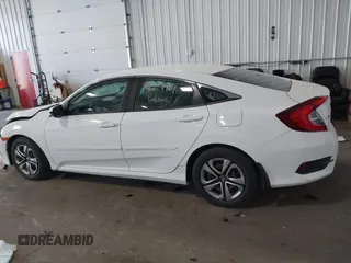 2017 Honda Civic LX with VIN 19XFC2F5XHE007668, listed as a IAAI auction lot 42219927 with 132,444 mi miles and . Bid and sale history available at DreamBid. Image 14.