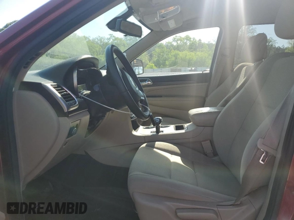 2014 Jeep Grand Cherokee Laredo with VIN 1C4RJEAG7EC274573, listed as a Copart auction lot 52637255 with 156,409 mi miles and Salvage Title. Bid and sale history available at DreamBid. Image 7.