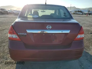 2009 Nissan Versa 1.8 S with VIN 3N1BC11E39L363606, listed as a Copart auction lot 65594774 with 110,191 mi miles and Salvage Title. Bid and sale history available at carsss.com. Image 6.