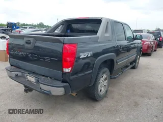2003 Chevrolet Avalanche with VIN 3GNEK13TX3G311583, listed as a IAAI auction lot 42032187 with 301,008 mi miles. Bid and sale history available at carsss.com. Image 4.