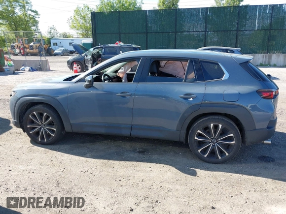 2023 Mazda CX-50 S Premium Plus with VIN 7MMVABEM8PN108020, listed as a IAAI auction lot 42203568 with 26,783 mi miles and . Bid and sale history available at DreamBid. Image 14.