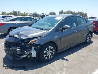 2021 Toyota Prius LE with VIN JTDKAMFPXM3170372, listed as a IAAI auction lot 42661609 with 47,977 mi miles and . Bid and sale history available at DreamBid. Image 18.