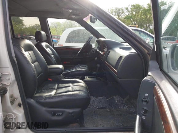 1998 Jeep Grand Cherokee Limited with VIN 1J4GZ78Y2WC164021, listed as a IAAI auction lot 42109012 with 1 mi miles. Bid and sale history available at carsss.com. Image 5.