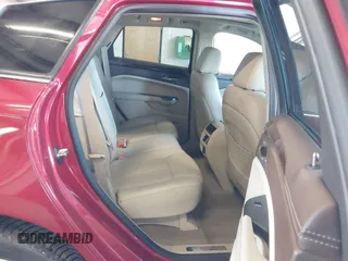 2016 Cadillac SRX Performance Collection with VIN 3GYFNCE37GS573250, listed as a IAAI auction lot 42443435 with 63,368 mi miles and . Bid and sale history available at DreamBid. Image 8.