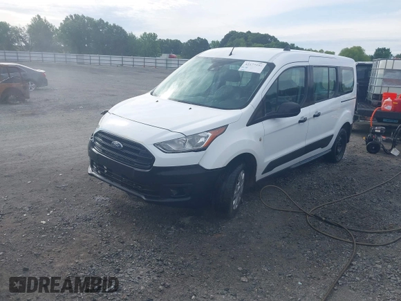 2019 Ford Transit Connect XL z VIN NM0GS9E20K1407608, wystawiony jako IAAI lot #42177594 z przebiegiem 55 951 mil mil oraz . Historia ofert i sprzedaży dostępna na DreamBid. Obrazek 19.