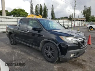 2019 Honda Ridgeline Sport with VIN 5FPYK2F15KB003142, listed as a Copart auction lot 57058235 with 173,049 mi miles and Clean title. Bid and sale history available at DreamBid. Image 4.