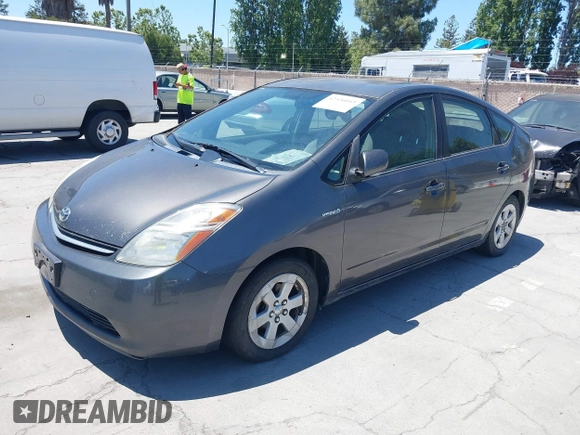 2007 Toyota Prius z VIN JTDKB20U173222332, wystawiony jako IAAI lot #42326043 z przebiegiem Nie podano mil oraz . Historia ofert i sprzedaży dostępna na DreamBid. Obrazek 2.