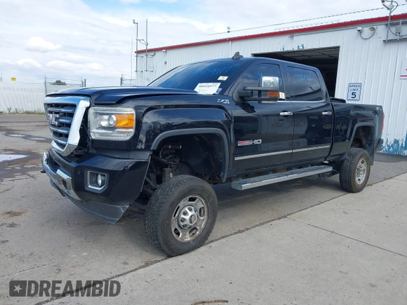 2015 GMC Sierra 2500HD SLT with VIN 1GT12ZE87FF552599, listed as a IAAI auction lot 40054977 with 146,190 mi miles and . Bid and sale history available at DreamBid. Image 16.