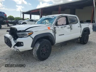 2021 Toyota Tacoma SR z VIN 3TMCZ5ANXMM442300, wystawiony jako Copart lot #57821665 z przebiegiem Nie podano mil oraz Szkoda całkowita • Salvage title. Historia ofert i sprzedaży dostępna na DreamBid. Obrazek 1.