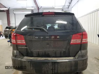 2017 Dodge Journey SE with VIN 3C4PDCAB4HT704902, listed as a Copart auction lot 51410815 with 153,976 mi miles and Salvage Title. Bid and sale history available at DreamBid. Image 6.