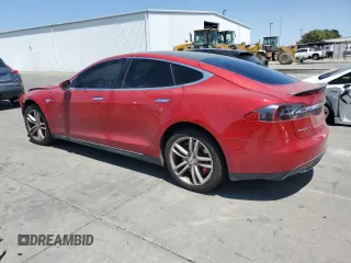 2014 Tesla Model S 60 with VIN 5YJSA1H1XEFP31861, listed as a Copart auction lot 65275815 with Not provided miles and Clean title. Bid and sale history available at DreamBid. Image 2.