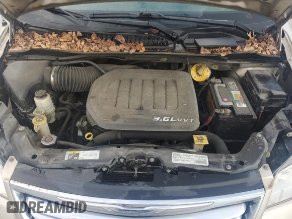 2015 Chrysler Town & Country Touring with VIN 2C4RC1BG2FR711051, listed as a Copart auction lot 54198195 with 191,545 mi miles and Salvage Title. Bid and sale history available at DreamBid. Image 12.