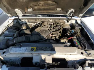 2002 Ford Explorer Sport Value z VIN 1FMYU60E32UD21981, wystawiony jako Copart lot #82619254 z przebiegiem 260 676 mil mil oraz Szkoda całkowita • Salvage title. Historia ofert i sprzedaży dostępna na DreamBid. Obrazek 11.