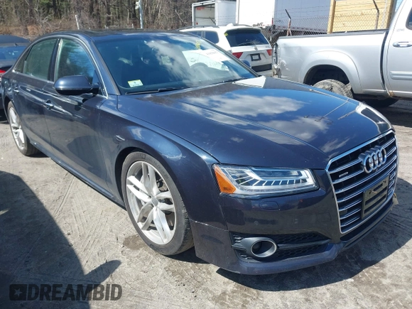 2016 Audi A8 L 4.0T Sport with VIN WAU43AFD1GN022253, listed as a IAAI auction lot 41858053 with 219,517 mi miles. Bid and sale history available at carsss.com. Image 1.