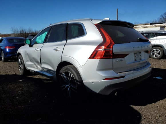 2018 Volvo XC60 Momentum with VIN LYV102RK3JB097333, listed as a Copart auction lot 81130574 with 76,499 mi miles and Salvage Title. Bid and sale history available at carsss.com. Image 2.