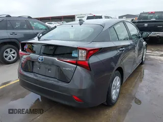2022 Toyota Prius L Eco with VIN JTDKAMFU4N3183352, listed as a IAAI auction lot 42170623 with 52,244 mi miles and . Bid and sale history available at DreamBid. Image 4.