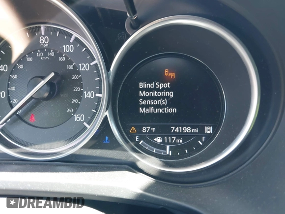 2017 Mazda CX-5 Grand Touring with VIN JM3KFADL6H0217850, listed as a IAAI auction lot 42033404 with 74,198 mi miles and . Bid and sale history available at carsss.com. Image 16.