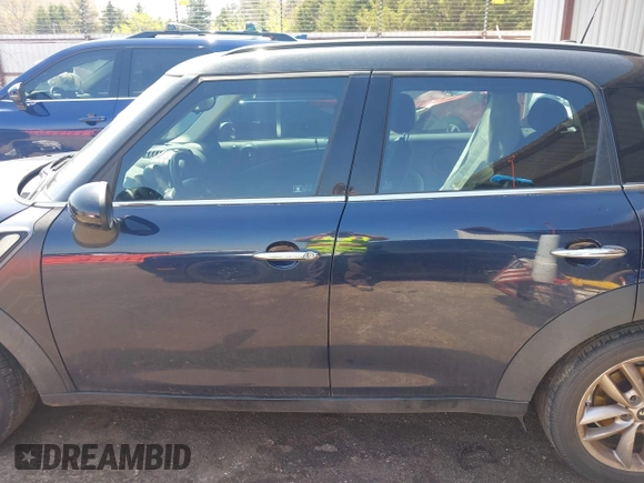 2014 MINI Countryman S with VIN WMWZC3C5XEWP27221, listed as a IAAI auction lot 41957817 with 112,353 mi miles and . Bid and sale history available at DreamBid. Image 15.