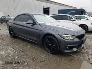 2018 BMW 4 Series 430i xDrive with VIN WBA4Z3C5XJEC55856, listed as a Copart auction lot 43193125 with 57,770 mi miles and Salvage Title. Bid and sale history available at DreamBid. Image 4.