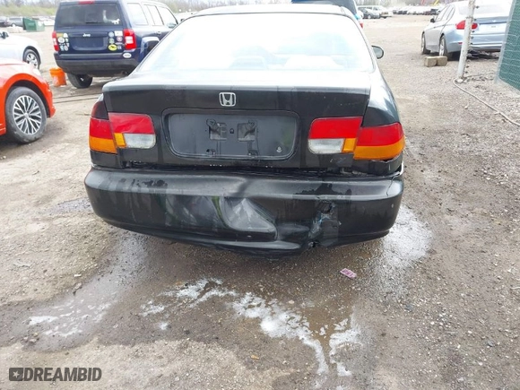 1997 Honda Civic EX with VIN 1HGEJ8242VL044722, listed as a IAAI auction lot 42045941 with 266,481 mi miles. Bid and sale history available at carsss.com. Image 6.