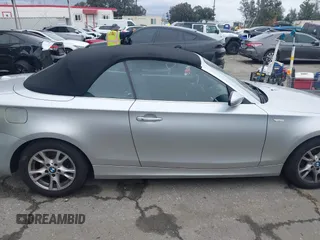 2009 BMW 1 Series 128i with VIN WBAUN13519VH81367, listed as a IAAI auction lot 41710584 with 94,462 mi miles and . Bid and sale history available at DreamBid. Image 14.