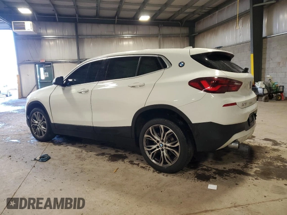 2022 BMW X2 xDrive28i with VIN WBXYJ1C03N5T55985, listed as a Copart auction lot 87183574 with 33,134 mi miles and Salvage Title. Bid and sale history available at carsss.com. Image 2.