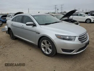 2016 Ford Taurus SEL with VIN 1FAHP2E9XGG144955, listed as a Copart auction lot 82207634 with 128,823 mi miles and Salvage Title. Bid and sale history available at DreamBid. Image 4.