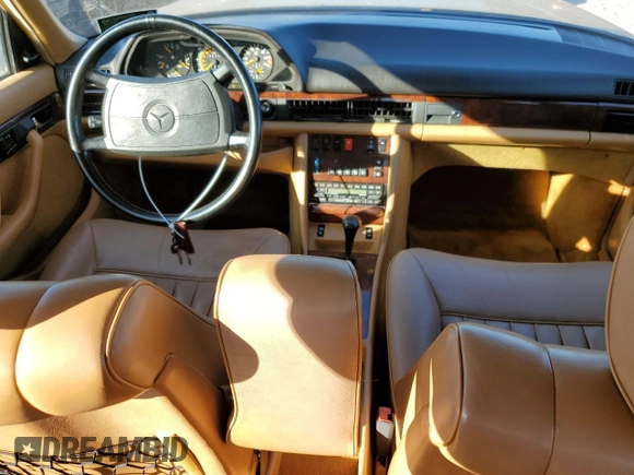 1986 Mercedes-Benz 560 with VIN WDBCA39DXGA233159, listed as a Copart auction lot 78498894 with 96,308 mi miles and Salvage Title. Bid and sale history available at DreamBid. Image 8.