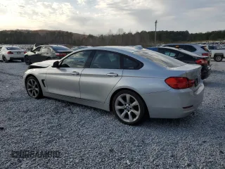 2015 BMW 4 Series 428i with VIN WBA4A5C59FG051139, listed as a Copart auction lot 45186185 with 141,839 mi miles and Clean Title. Bid and sale history available at DreamBid. Image 2.