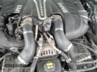 2018 BMW 5 Series M550i xDrive with VIN WBAJB9C50JB036915, listed as a Copart auction lot 69015695 with 85,269 mi miles and Salvage title. Bid and sale history available at DreamBid. Image 13.