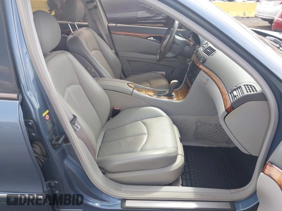 2003 Mercedes-Benz E-Class 3.2L with VIN WDBUF65J43A232053, listed as a IAAI auction lot 41930685 with 74,675 mi miles. Bid and sale history available at carsss.com. Image 5.