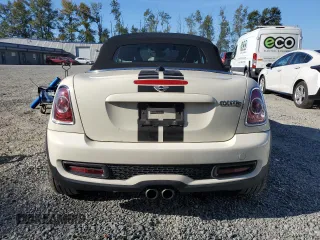 2015 MINI Roadster S z VIN WMWSY3C56FT595466, wystawiony jako Copart lot #69655944 z przebiegiem 53 971 mil mil oraz Szkody całkowita. Historia ofert i sprzedaży dostępna na DreamBid. Obrazek 6.