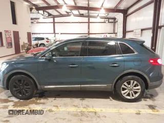 2016 Lincoln MKX Premiere z VIN 2LMTJ8JR7GBL40163, wystawiony jako IAAI lot #42231884 z przebiegiem 143 870 mil mil oraz . Historia ofert i sprzedaży dostępna na DreamBid. Obrazek 14.