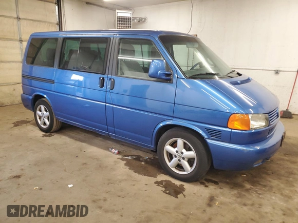 2003 Volkswagen EuroVan с VIN WV2KB47053H044308, выставлен на аукционе Copart как лот 81267494 с пробегом 174 679 миль миль и Чистый • Clean title. История ставок и продаж доступна на DreamBid. Изображение 4.