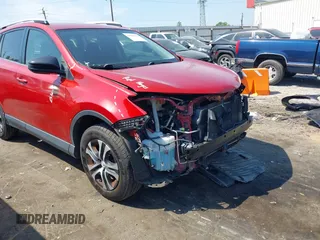 2016 Toyota RAV4 LE with VIN JTMZFREV1GJ098247, listed as a IAAI auction lot 42065800 with 199,172 mi miles and . Bid and sale history available at DreamBid. Image 18.