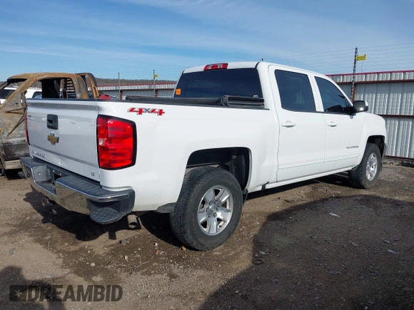2017 Chevrolet Silverado 1500 LT with VIN 3GCUKREC5HG414935, listed as a IAAI auction lot 41064938 with 197,767 mi miles and . Bid and sale history available at DreamBid. Image 4.