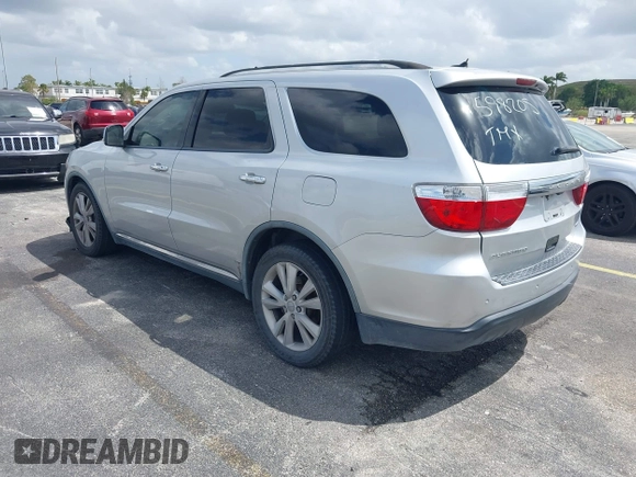2011 Dodge Durango Crew with VIN 1D4RD4GGXBC598205, listed as a IAAI auction lot 41908965 with 182,875 mi miles and . Bid and sale history available at carsss.com. Image 3.