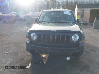 2014 Jeep Patriot Latitude with VIN 1C4NJRFB4ED720241, listed as a IAAI auction lot 40914199 with 128,218 mi miles. Bid and sale history available at carsss.com. Image 6.