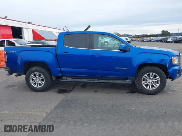 2019 GMC Canyon 4WD SLE with VIN 1GTG6CEN6K1304918, listed as a IAAI auction lot 41624468 with 102,579 mi miles. Bid and sale history available at carsss.com. Image 13.