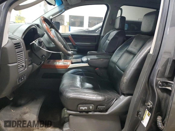 2004 Infiniti QX56 with VIN 5N3AA08C94N801148, listed as a Copart auction lot 52417335 with 300,620 mi miles and Clean Title. Bid and sale history available at carsss.com. Image 7.