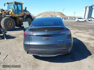 2025 Tesla Model Y Long Range with VIN 7SAYGDEE1SA351255, listed as a IAAI auction lot 41816235 with 1,463 mi miles. Bid and sale history available at carsss.com. Image 15.