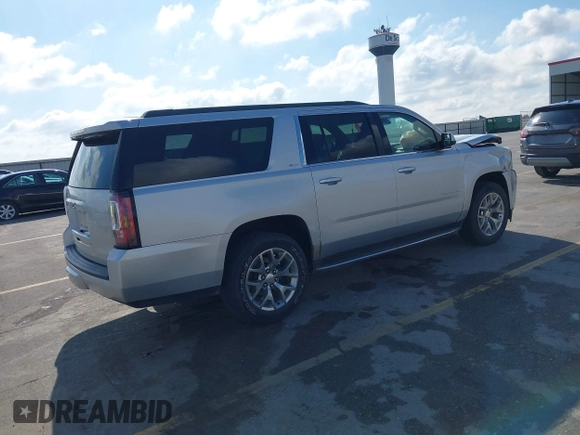 2015 GMC Yukon XL SLT z VIN 1GKS2HKCXFR618783, wystawiony jako IAAI lot #42081053 z przebiegiem 230 368 mil mil oraz . Historia ofert i sprzedaży dostępna na DreamBid. Obrazek 4.