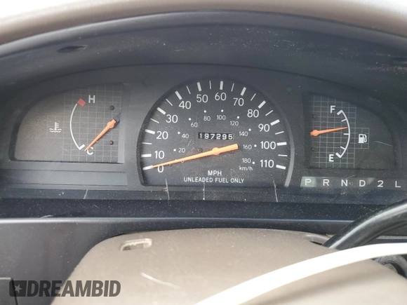 1999 Toyota Tacoma z VIN 4TANL42N4XZ435246, wystawiony jako Copart lot #56843025 z przebiegiem 197 295 mil mil oraz Szkoda całkowita • Salvage title. Historia ofert i sprzedaży dostępna na DreamBid. Obrazek 9.