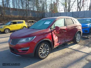 2015 Lincoln MKC with VIN 5LMTJ2AH0FUJ03004, listed as a IAAI auction lot 41997706 with 187,671 mi miles. Bid and sale history available at carsss.com. Image 2.