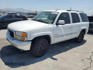 2005 GMC Yukon SLT z VIN 1GKEC13V65J174655, wystawiony jako Copart lot #59050755 z przebiegiem 93 893 mil mil oraz Czysty tytuł • Clean title. Historia ofert i sprzedaży dostępna na DreamBid. Obrazek 1.