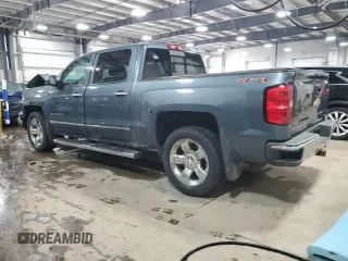 2014 Chevrolet Silverado 1500 LTZ with VIN 3GCUKSEC9EG245991, listed as a Copart auction lot 46620565 with 128,370 mi miles and Salvage Title. Bid and sale history available at DreamBid. Image 2.