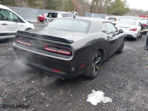 2015 Dodge Challenger R/T with VIN 2C3CDZAT9FH782760, listed as a IAAI auction lot 41531276 with 76,957 mi miles. Bid and sale history available at carsss.com. Image 4.
